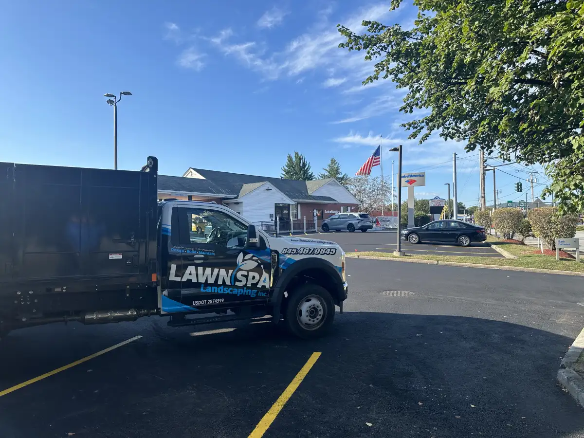 Lawn Spa team reviewing a completed patio project